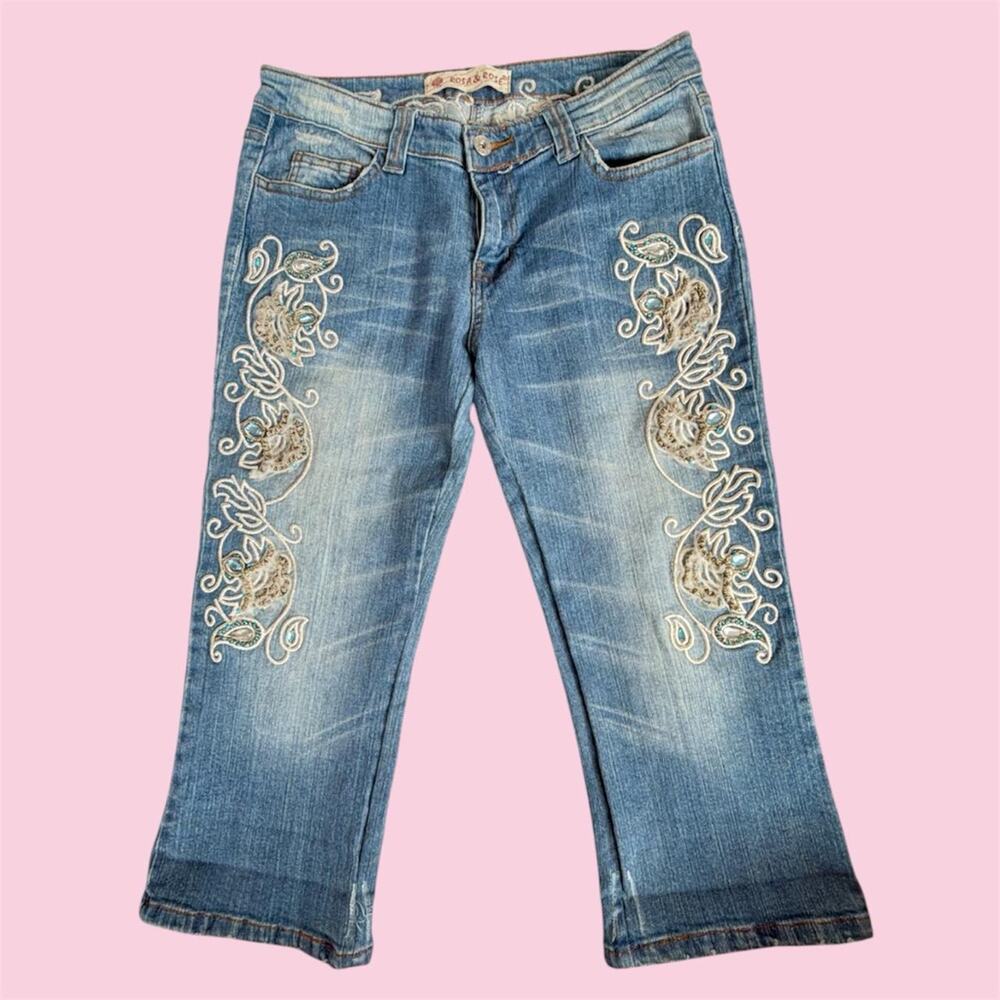 Rosa & Rose blue jeans with white floral embroidery and bedazzled embellishments